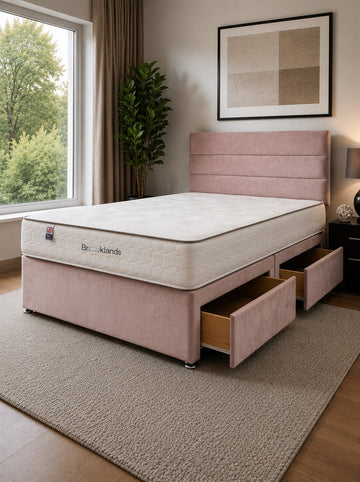 Premium divan bed with integrated storage drawers in a modern British bedroom.