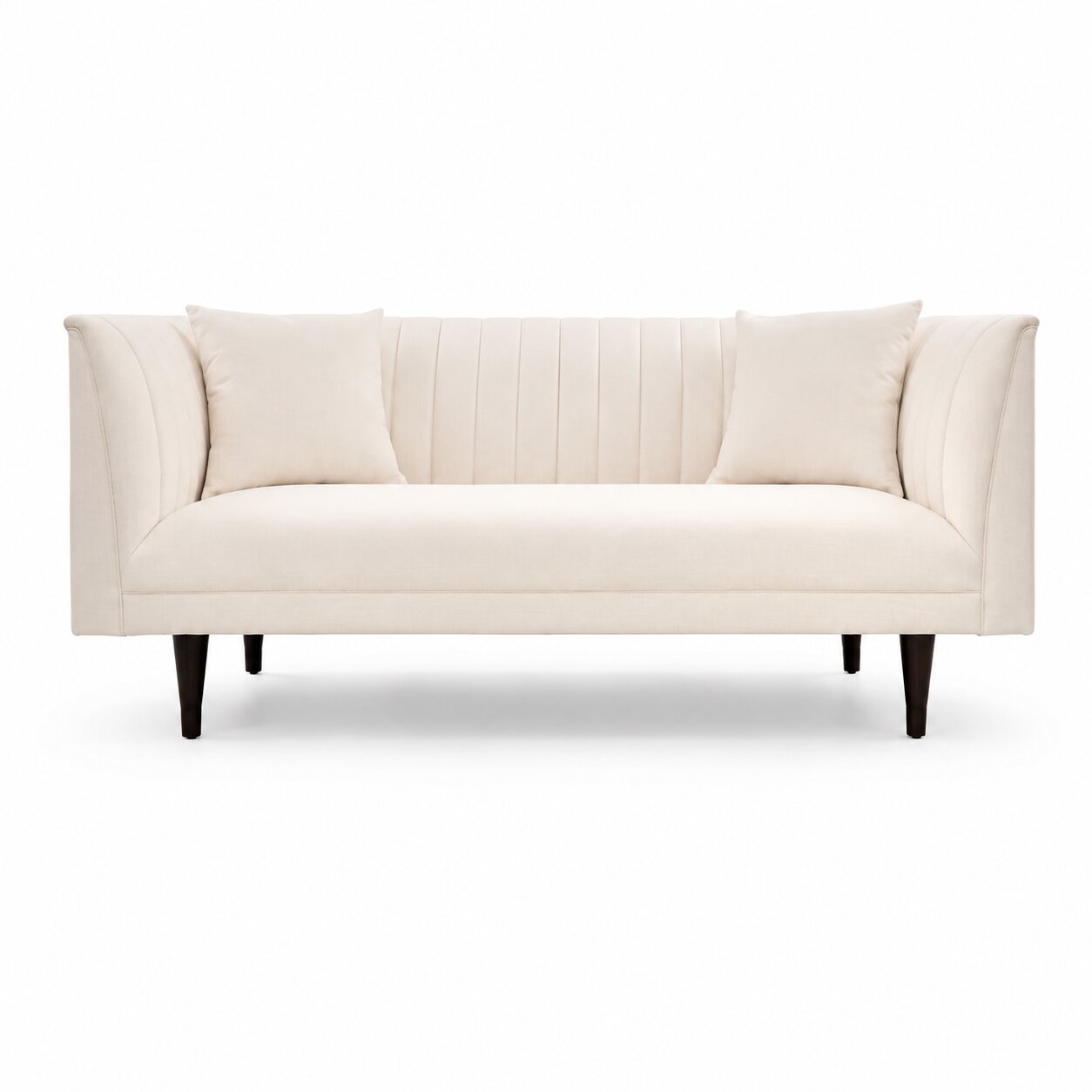 An off-white upholstered loveseat with vertical channel tufting on the backrest, two matching throw pillows, and tapered dark legs, shown against a plain white background.