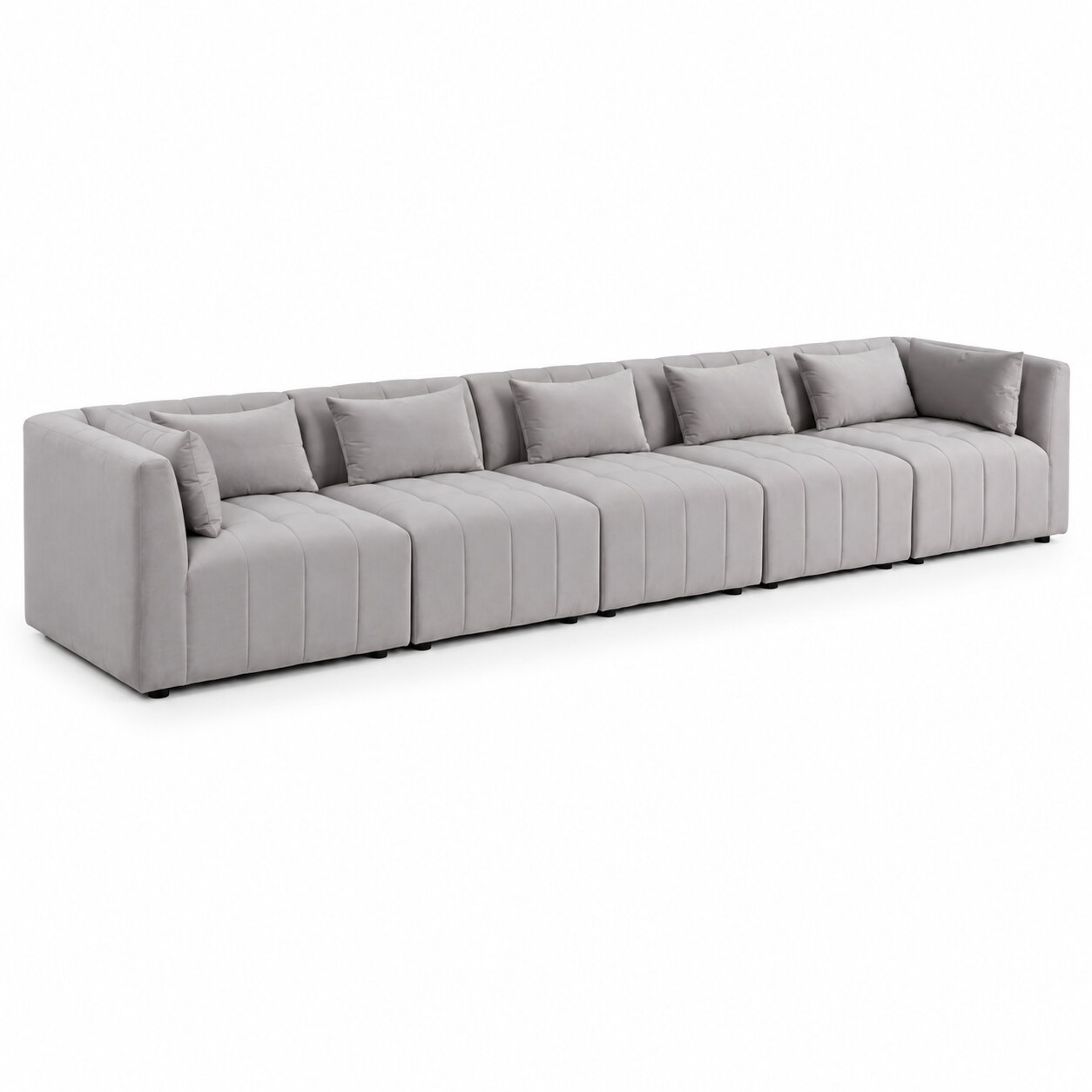 A modern modular sectional sofa upholstered in light gray fabric, featuring segmented seat cushions with vertical channel tufting and matching throw pillows, shown on a plain white background.