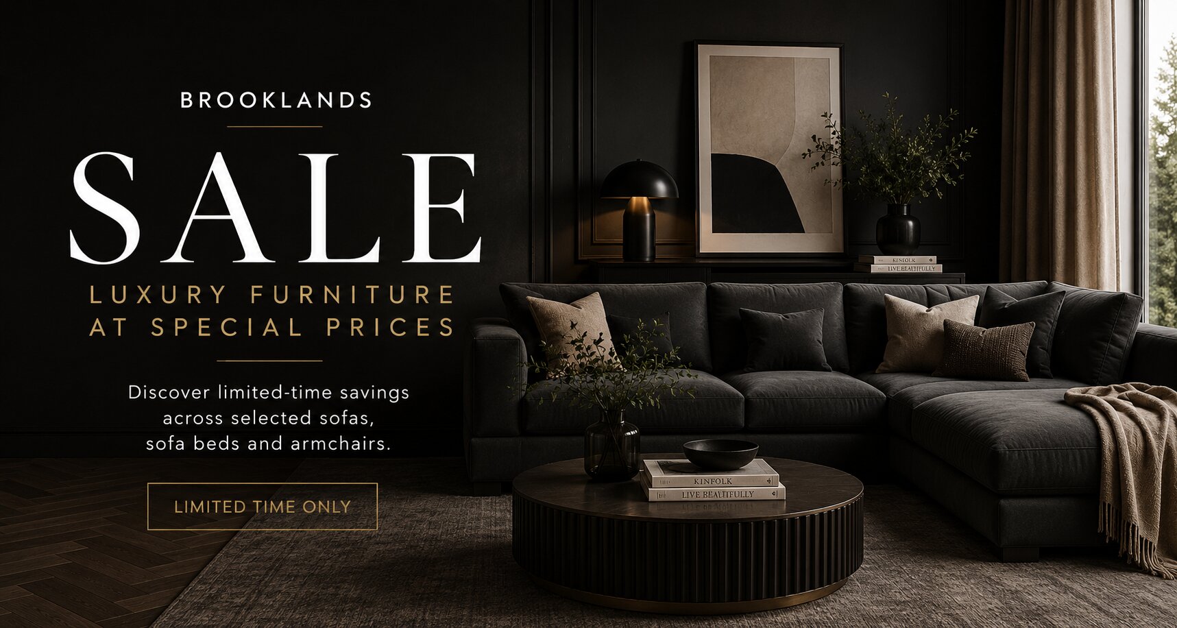 Promotional banner for a furniture sale in Brooklands, featuring a dark gray sectional sofa in a modern, moody living room setting with a round wooden coffee table and a large text overlay.