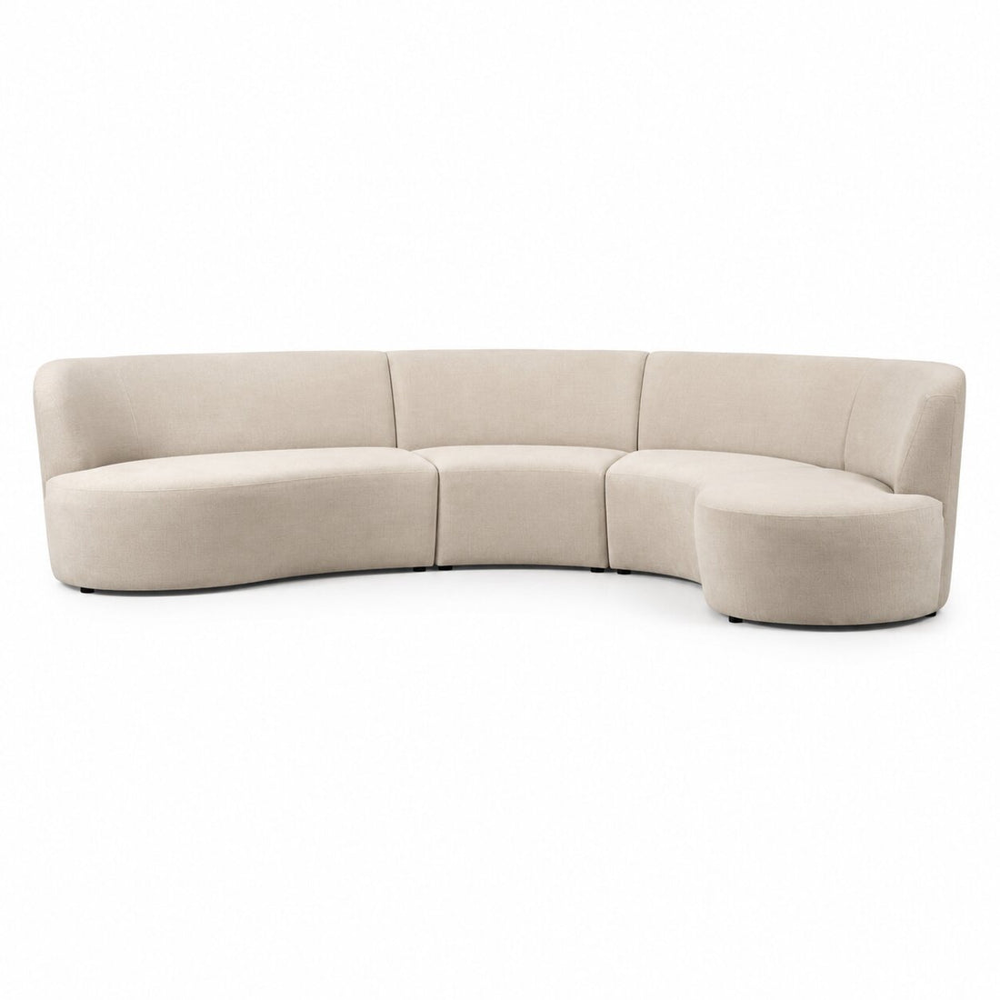 A curved modular upholstered sofa in a light beige fabric, shown from a front three-quarter angle against a plain white background.